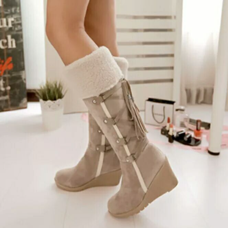 Brown women's wedge winter boots with fluffy fur lining, perfect for casual cold weather style