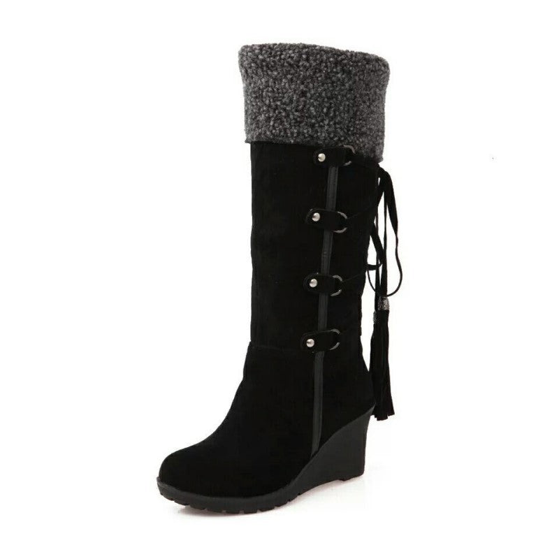 Pair of women's trendy fur lined wedge winter boots, ideal for fashion and warmth in cold climates