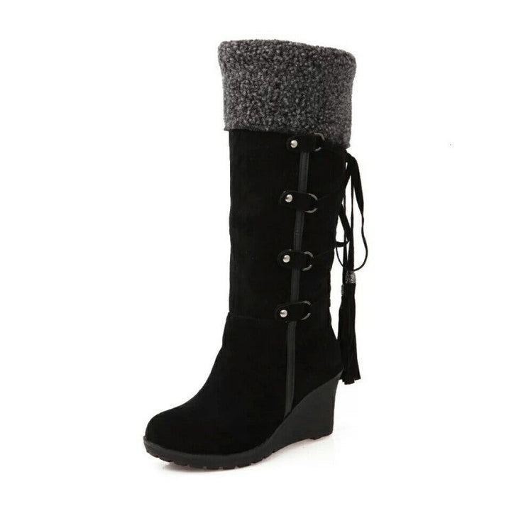 Pair of women's trendy fur lined wedge winter boots, ideal for fashion and warmth in cold climates