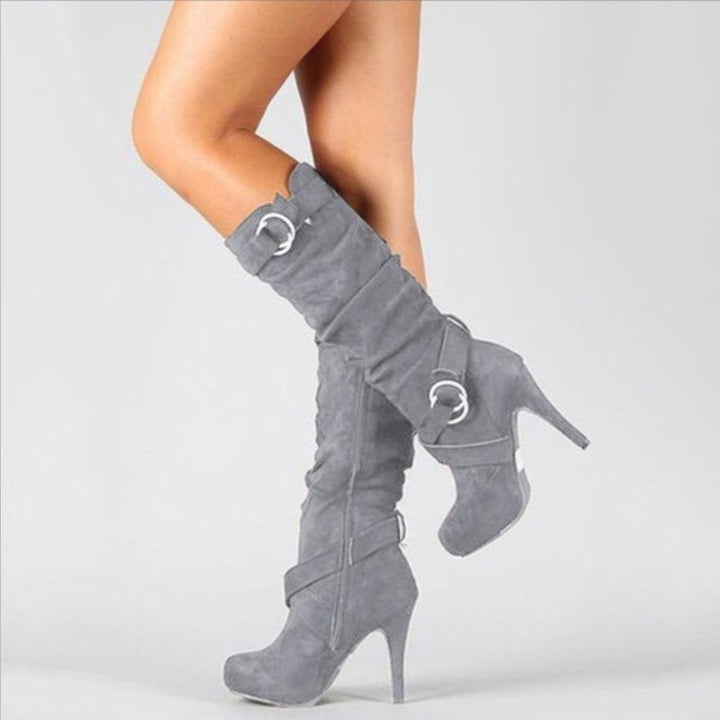 Women's black high heel buckle ankle boots, perfect for fashionable winter or dressy casual wear.