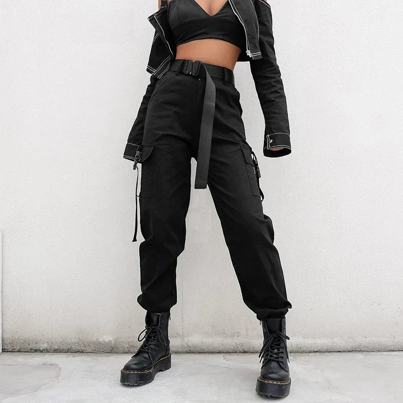 Women's black high waist cargo pants, featuring an elastic waist and multi-pockets for stylish everyday utility wear.