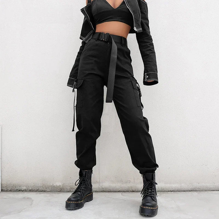 Women's black high waist cargo pants, featuring an elastic waist and multi-pockets for stylish everyday utility wear.