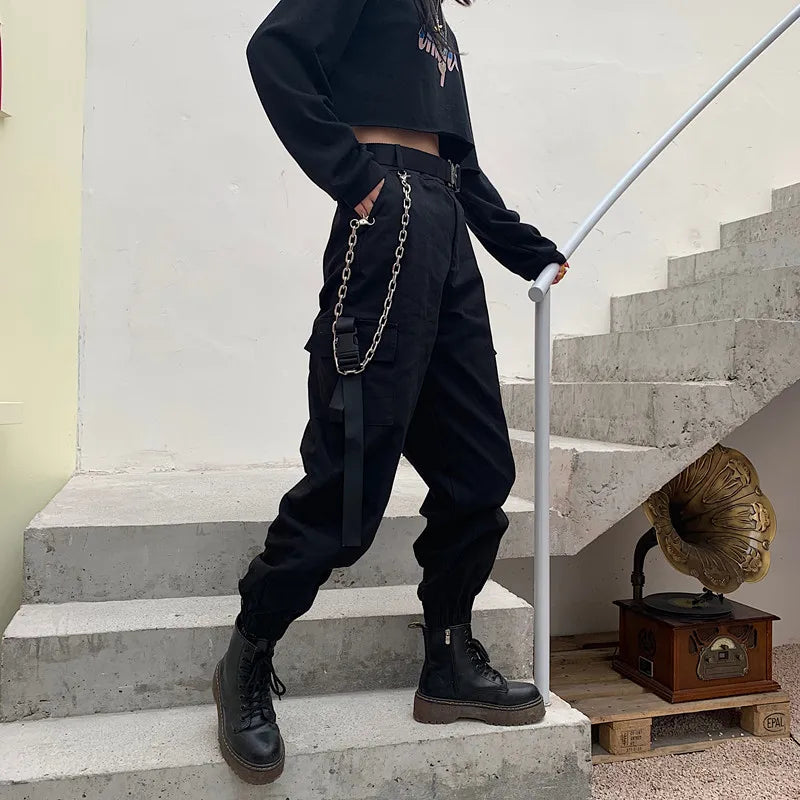Stylish black high waist cargo pants for women, designed with multi-pockets and an elastic waist for everyday adventures.