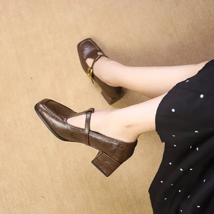 French-inspired black T-strap Mary Janes, women's elegant footwear with a comfortable block heel.