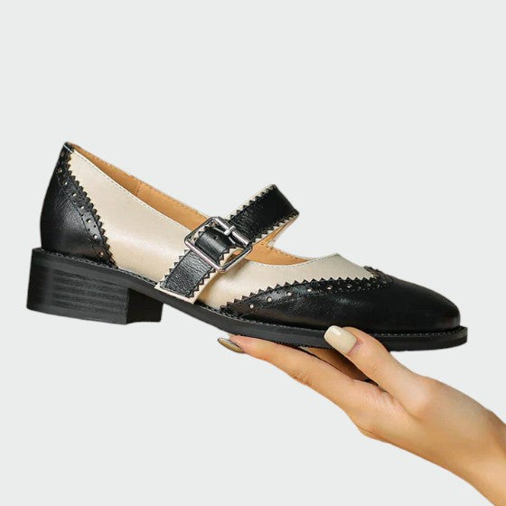 Sophisticated women's leather Mary Janes with a comfortable block heel and secure buckle closure
