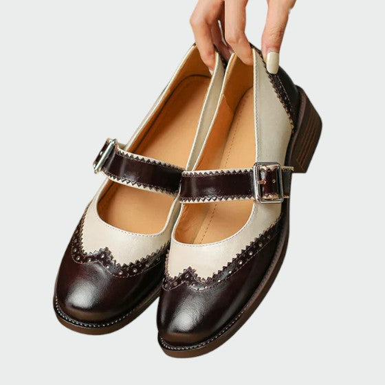 Close-up of the elegant black leather texture on women's Mary Jane block heel casual shoes