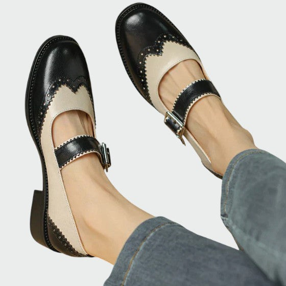 Pair of women's black leather Mary Jane block heel shoes, versatile for casual or elegant wear