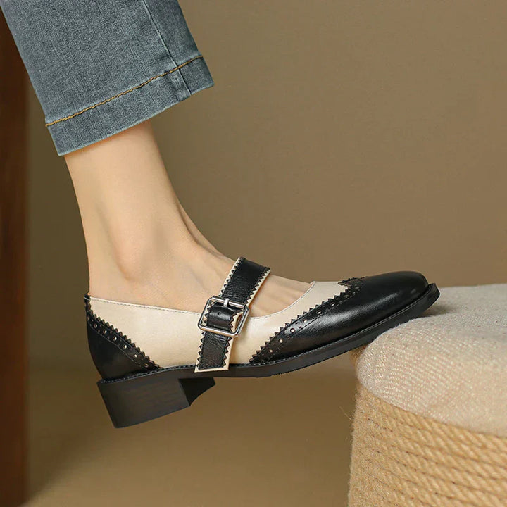 Vintage style women's brown leather Mary Jane shoes, comfortable flat design for everyday casual footwear.