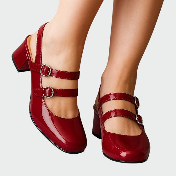 Women's black leather orthopedic Mary Jane flats with adjustable strap for comfortable casual wear.