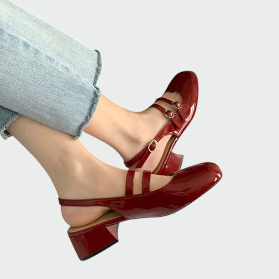 Elegant women's brown leather Mary Jane flats, orthopedic design for supportive and comfortable footwear.