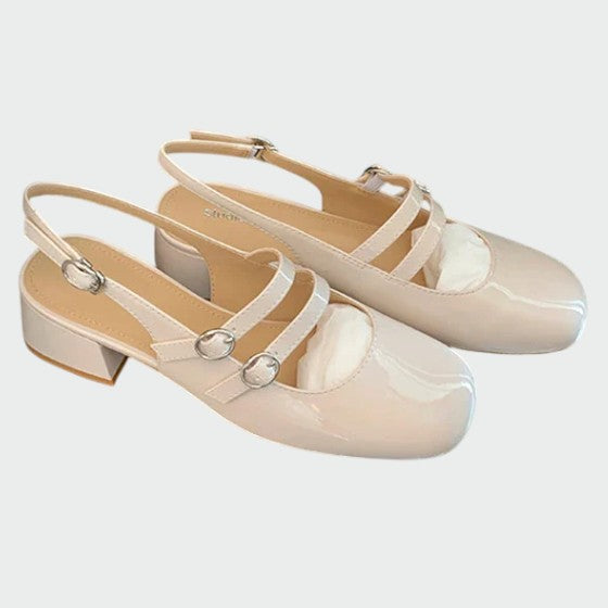 Close-up of a women's leather Mary Jane flat, highlighting orthopedic features and elegant design.