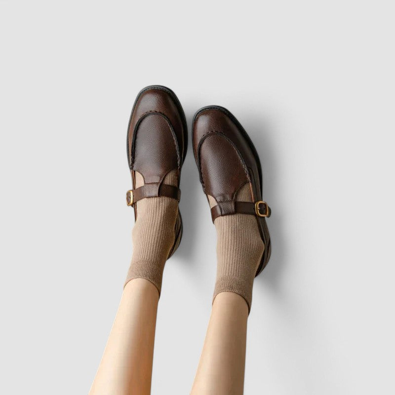 Close-up of a square toe black leather orthopedic Mary Jane shoe for women, comfortable design