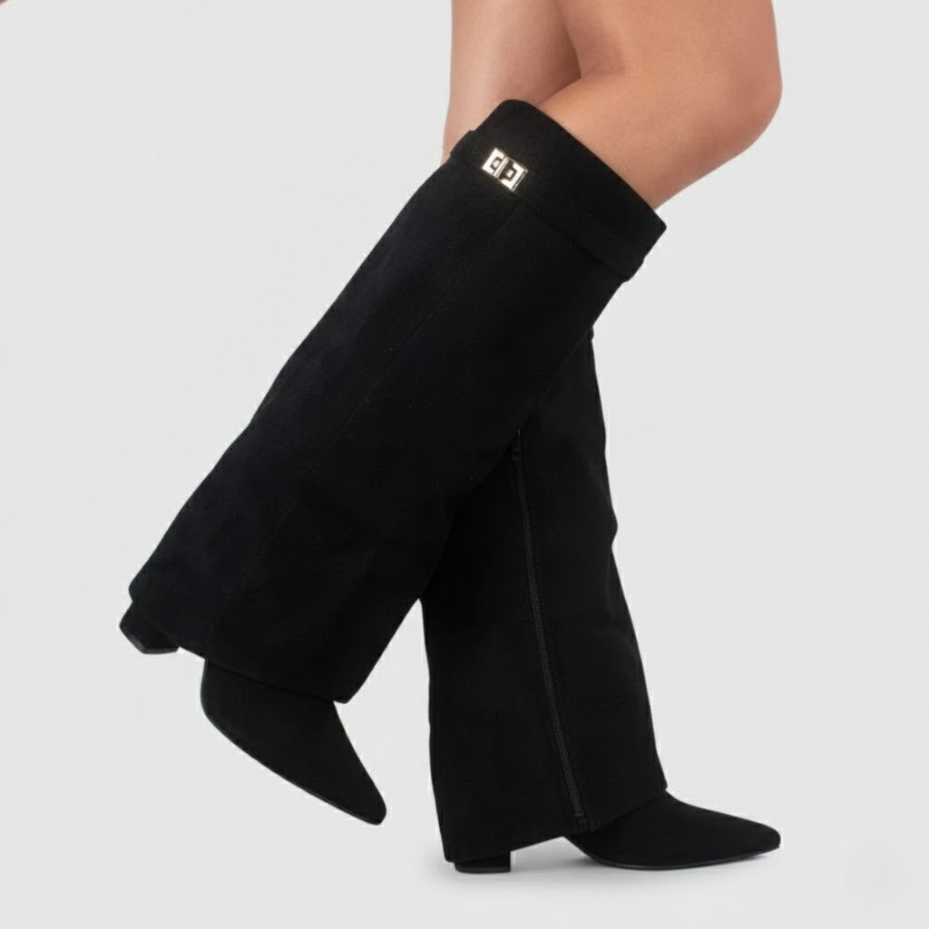Women's black leather thigh-high boots with elegant buckle detail and pointed toe.