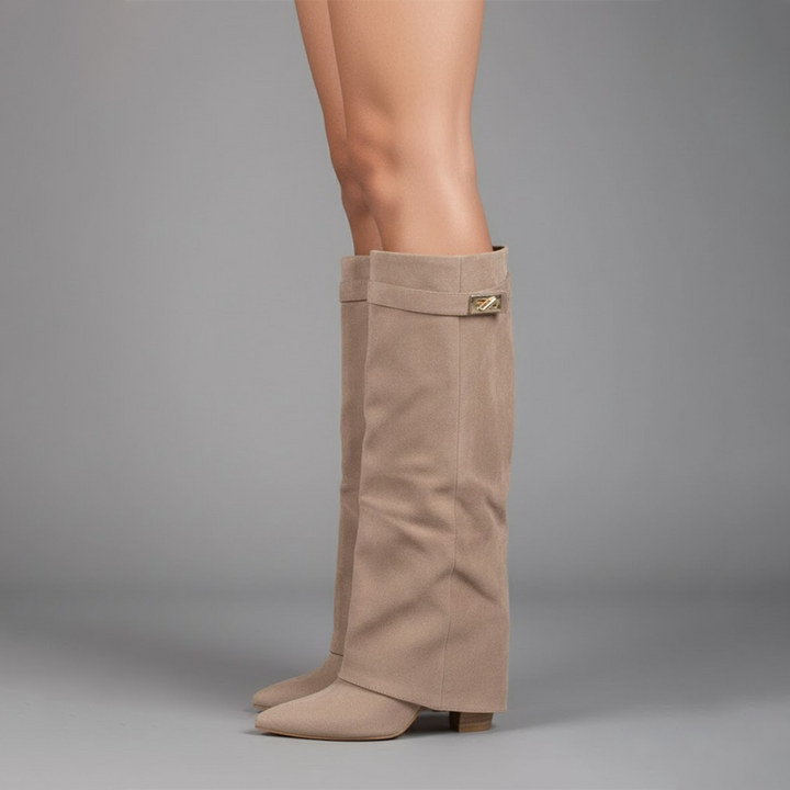 Elegant women's beige leather thigh-high boots, perfect for winter and fashion styling.
