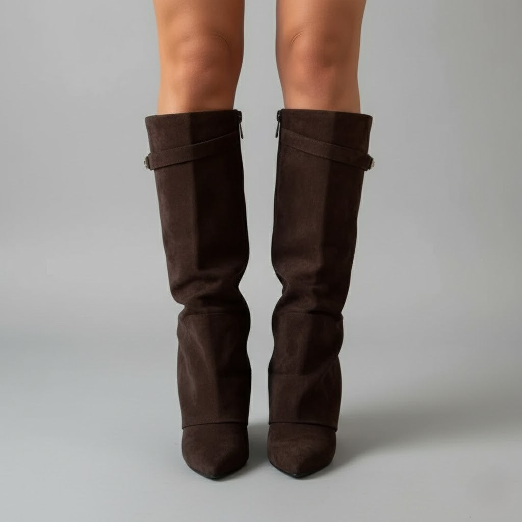 Women's leather thigh-high boots with buckle detail, shown from a three-quarter angle.