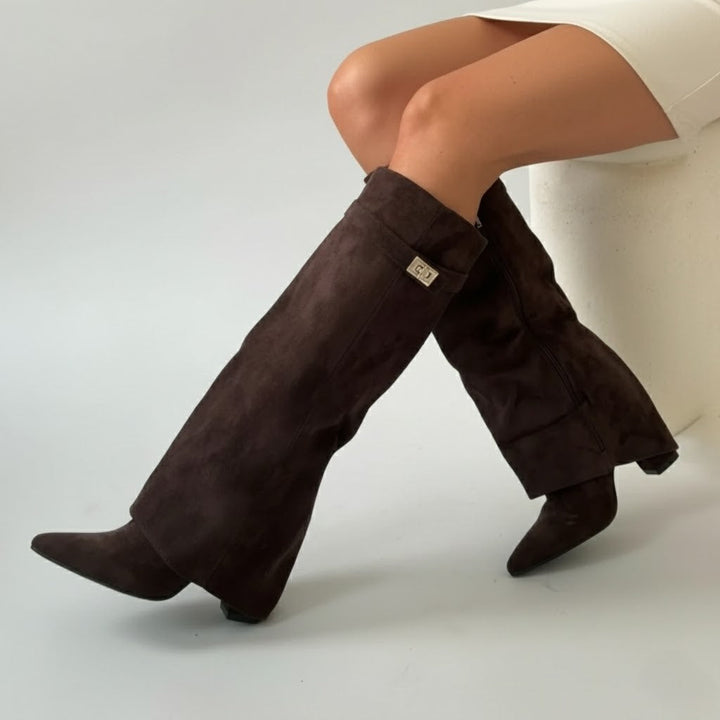 Fashionable women's beige suede thigh-high boots with multiple buckle straps.