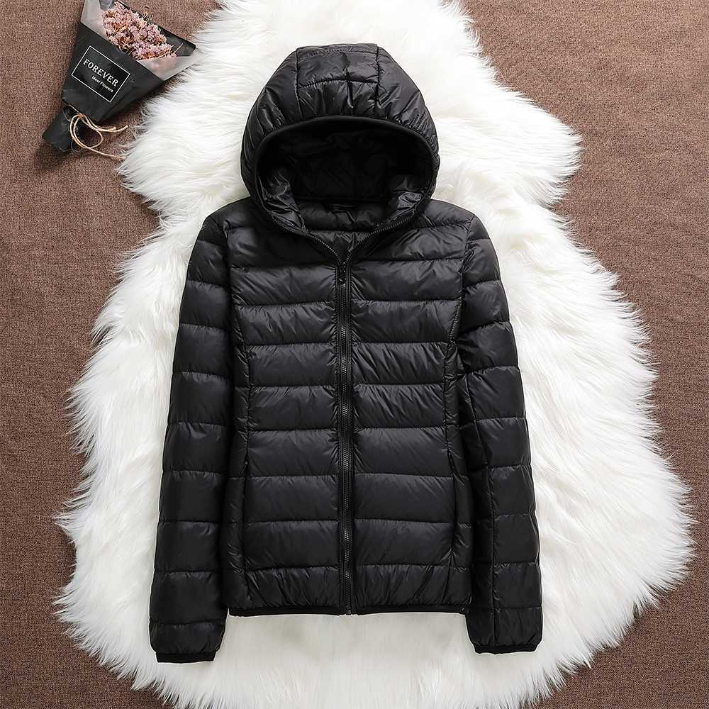 Lightweight women's down jacket in red, a chic and warm option for winter and outdoor adventures.