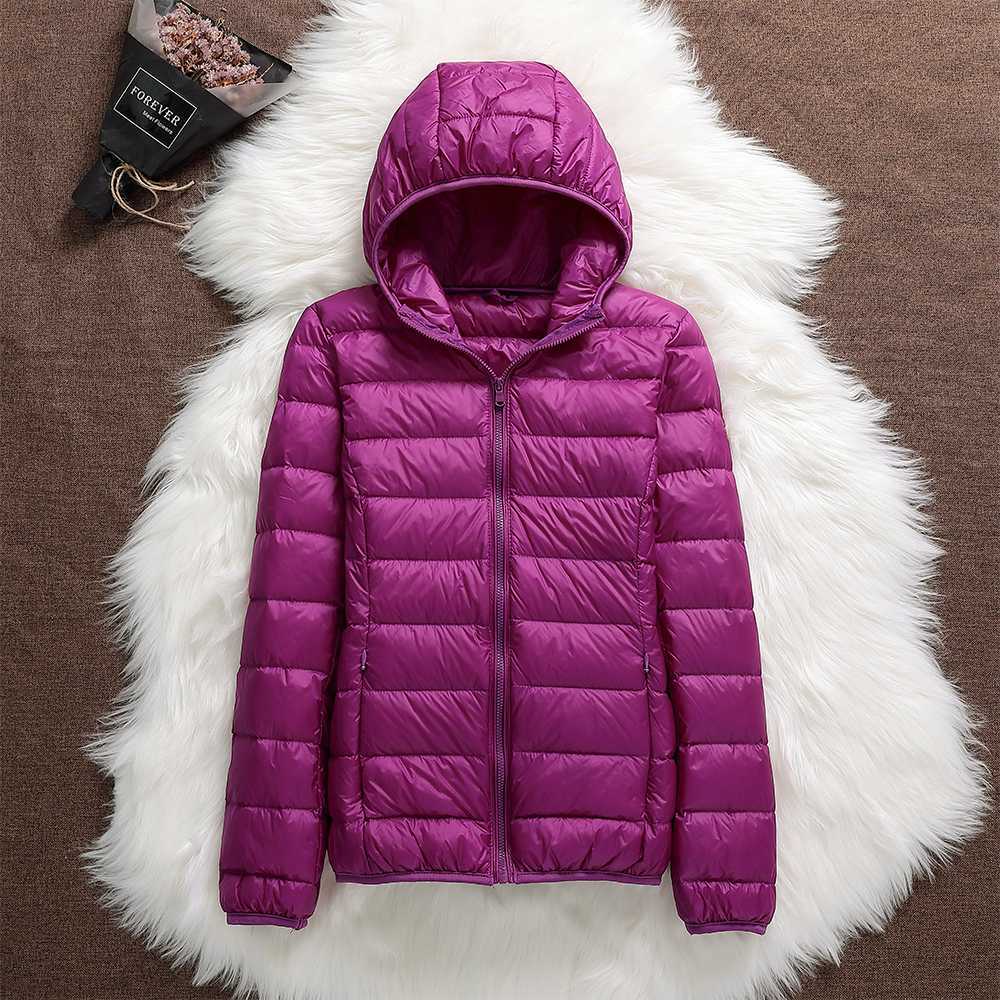 Women's waterproof winter coat in cream, a warm and elegant choice for cold climates.