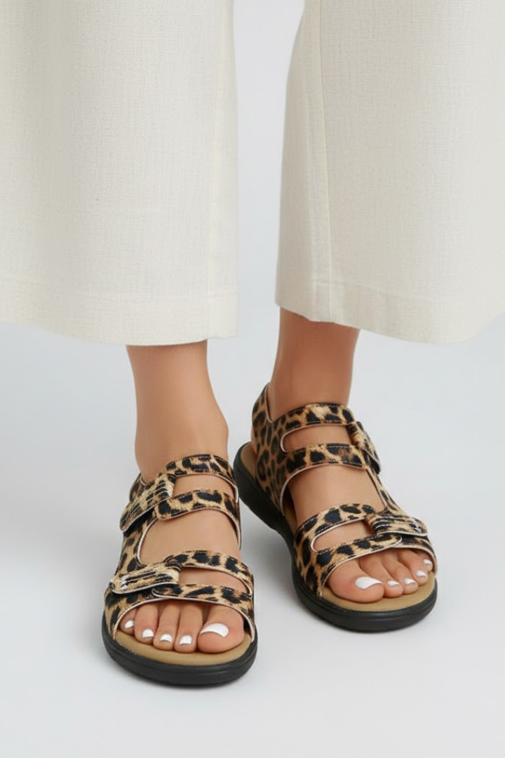 Stylish women's multi-strap heeled sandals in nude, perfect for fashion outfits