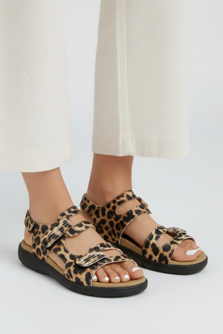 Close-up of a women's multi-strap heeled sandal showing buckle detail, casual summer shoes
