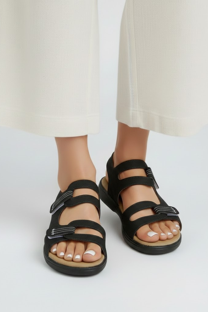 Back view of women's multi-strap heeled sandals, showcasing heel design, casual yet elegant