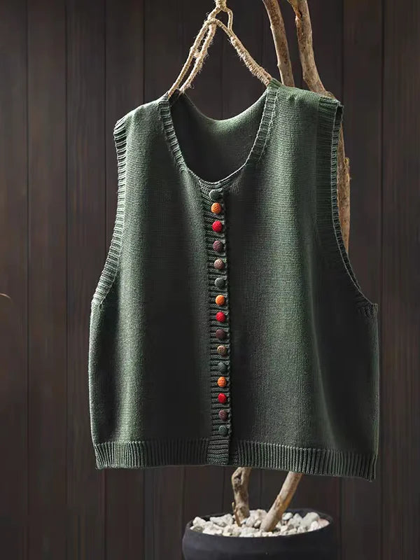 Close-up of a women's white open front cardigan sweater, demonstrating knit texture