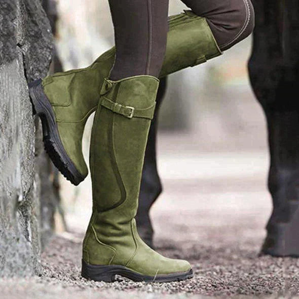 Detailed sole view of women's orthopedic leather riding boots, showing comfort features, winter style