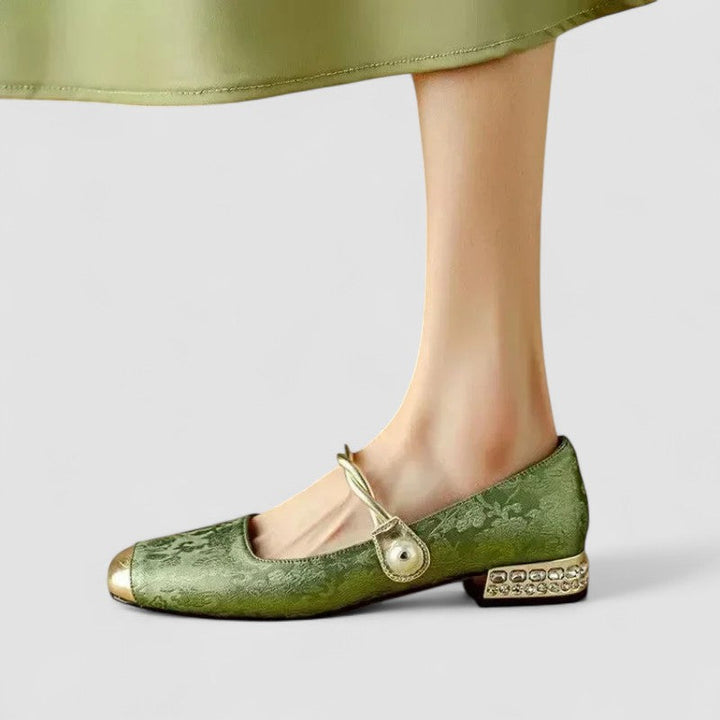 Pair of women's orthopedic Mary Jane low heel shoes in a neutral color, perfect for all-day comfort.