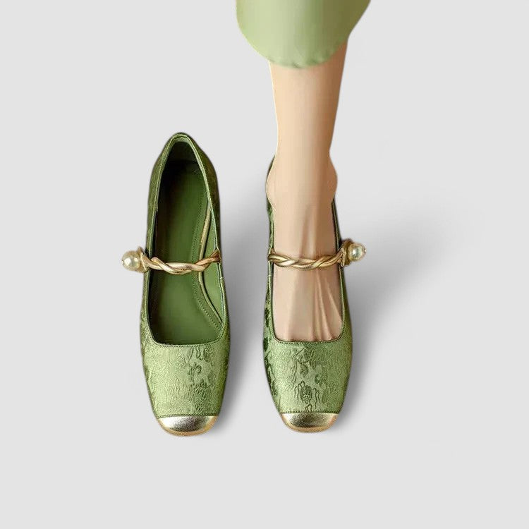 Close-up of the strap and buckle on a women's orthopedic Mary Jane low heel shoe.