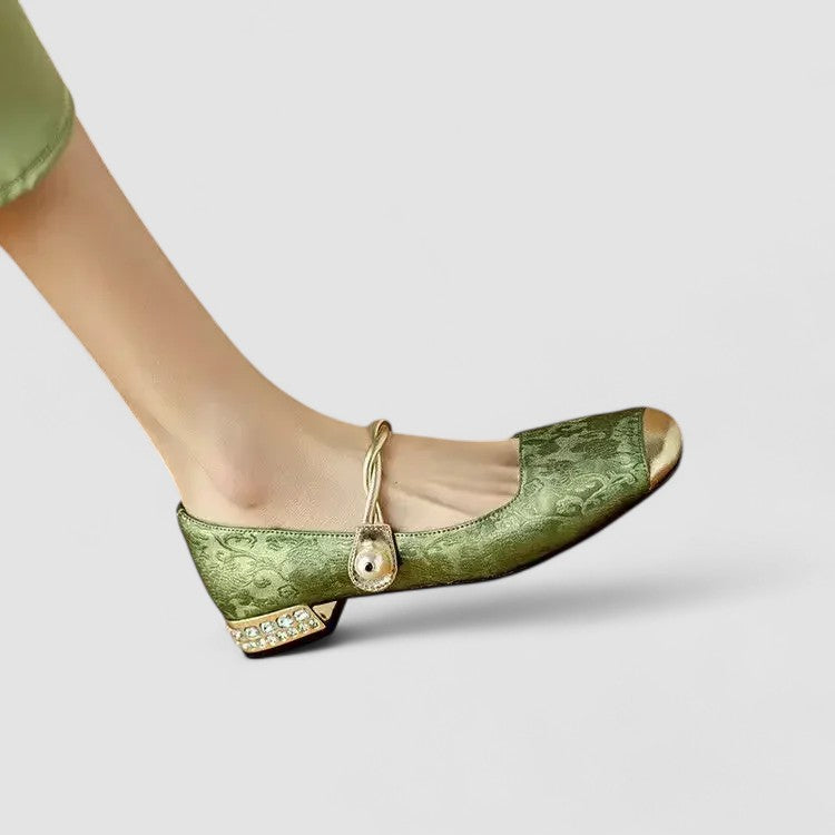 Side view of a women's orthopedic Mary Jane shoe, showcasing the supportive low heel.