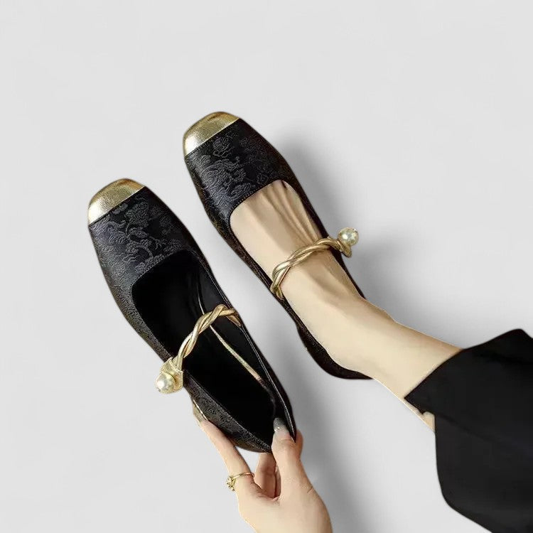 Front view of black orthopedic Mary Jane women's shoes, emphasizing the classic design and low heel.