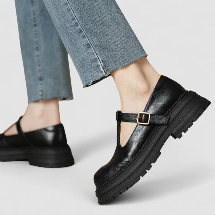 Profile view of a women's orthopedic Mary Jane winter shoe, designed for comfort and support in cold conditions