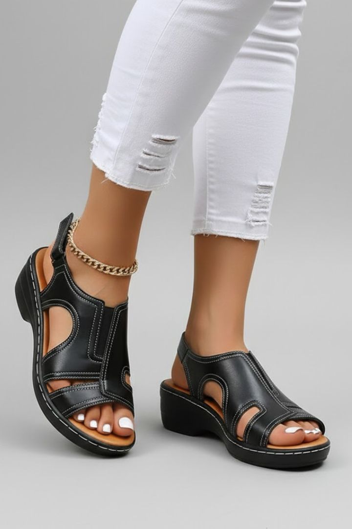 Fashionable women's platform sandals with modern cutout design, suitable for casual wear
