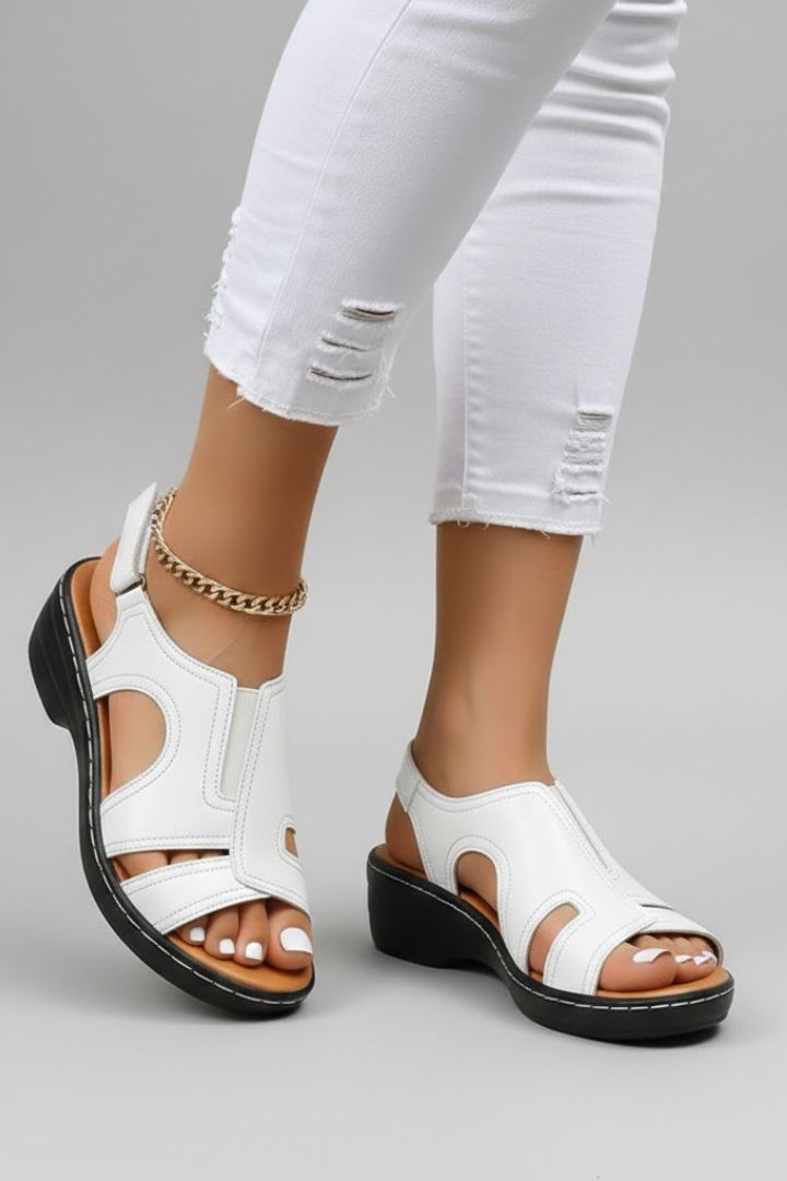 Studio shot of women's platform open-toe cutout sandals, elevated summer style