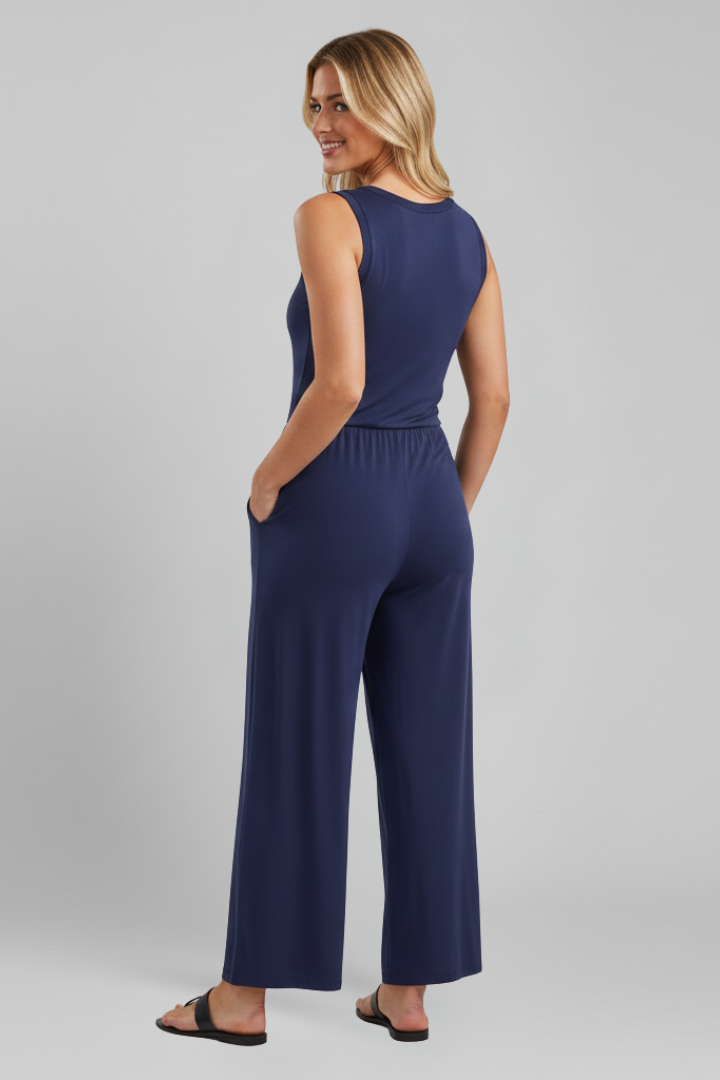 Close-up of the elastic waist detail on a women's wide leg jumpsuit, showing comfort and fit
