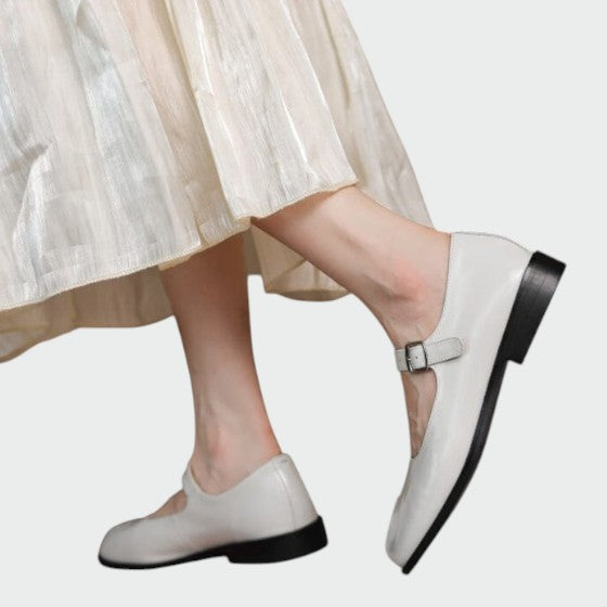 Classic black split-toe Mary Jane shoes for women, featuring an adjustable buckle and comfortable block heel.