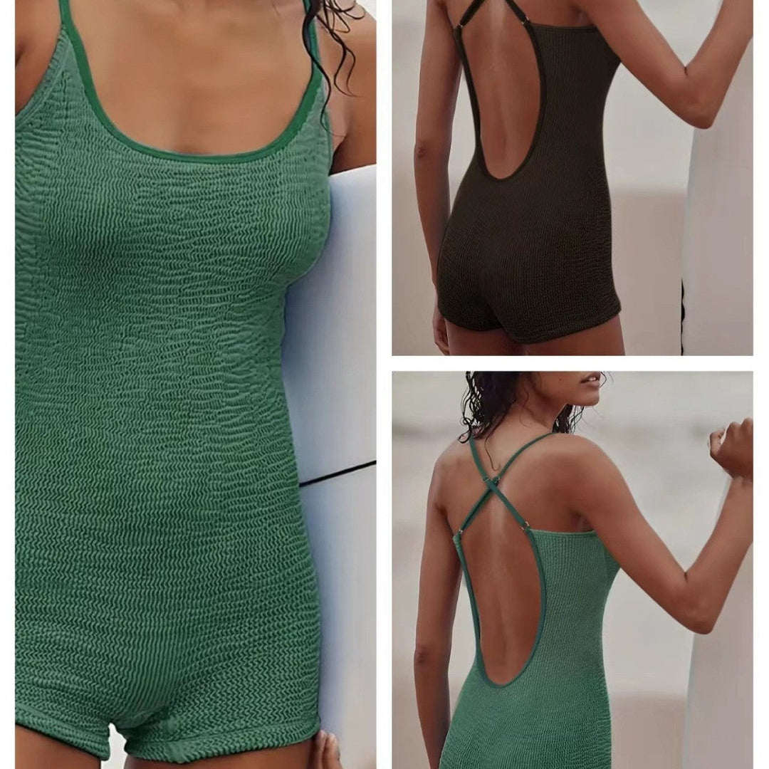 Women's black sporty one-piece swimsuit, comfortable & stylish for athletic swimming, beach, & pool.