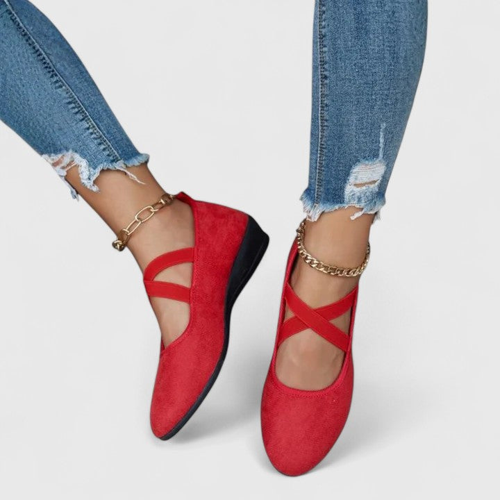 Pair of women's strappy round-toe wedge flats in navy, versatile and fashionable summer sandals.
