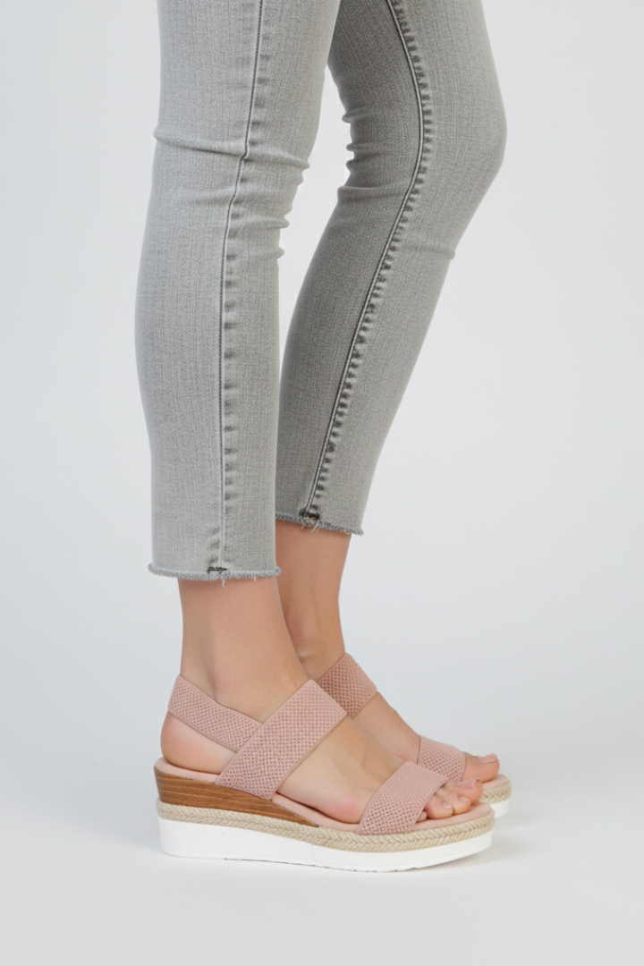 Close-up of the raised sole on women's stretch fit sandals, offering extra comfort and height.