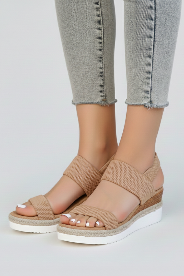 Top-down view of women's open-toe stretch sandals, showcasing the simple and elegant design.