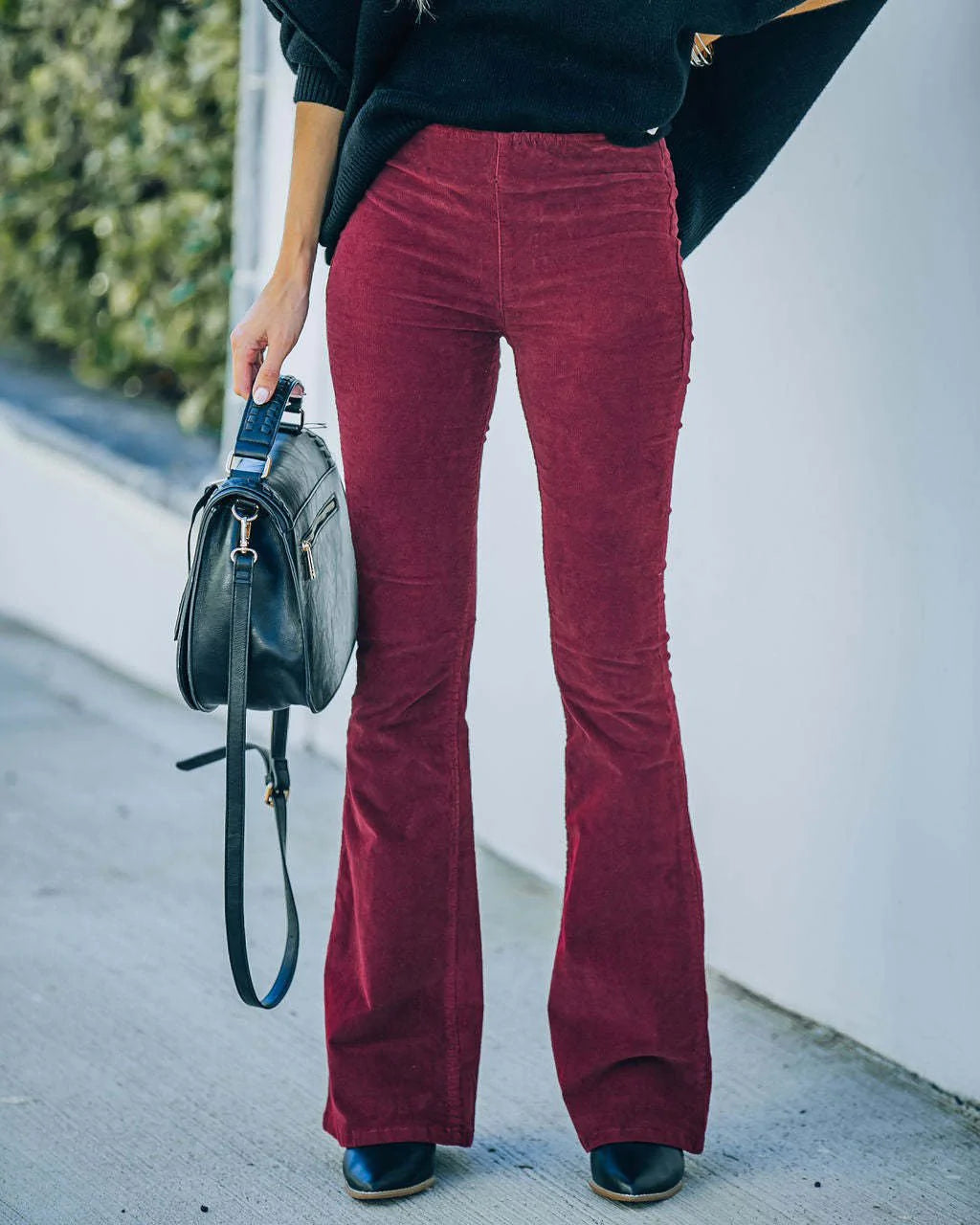 Versatile women's high-waisted flare pants, stretchy material, comfortable fashion bottoms for everyday wear.