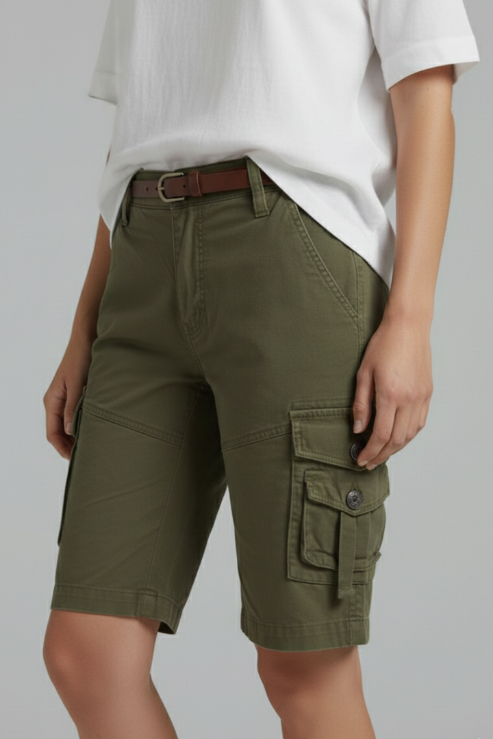 Stylish women's white cargo shorts, designed with practical utility pockets for summer outfits.