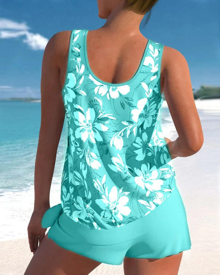New women's swimwear: a black V-neck tankini and boyshorts for summer beachwear