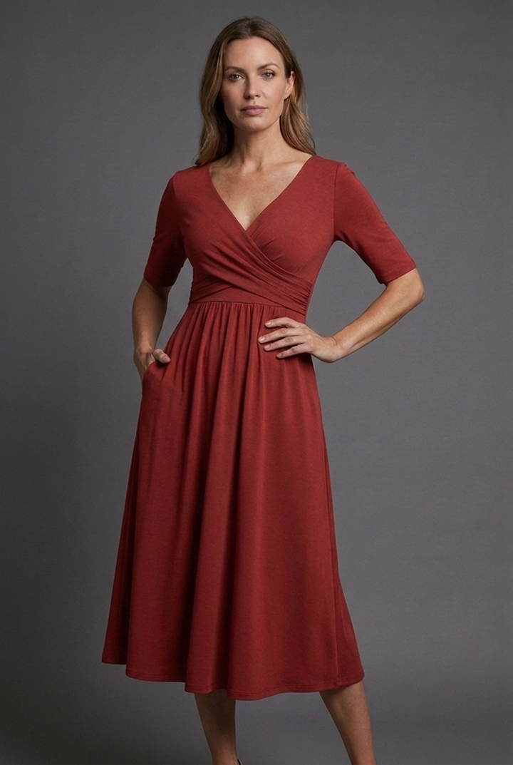 Stylish red women's midi wrap dress with a flattering V-neck, short sleeves, and practical pockets, summer ready.