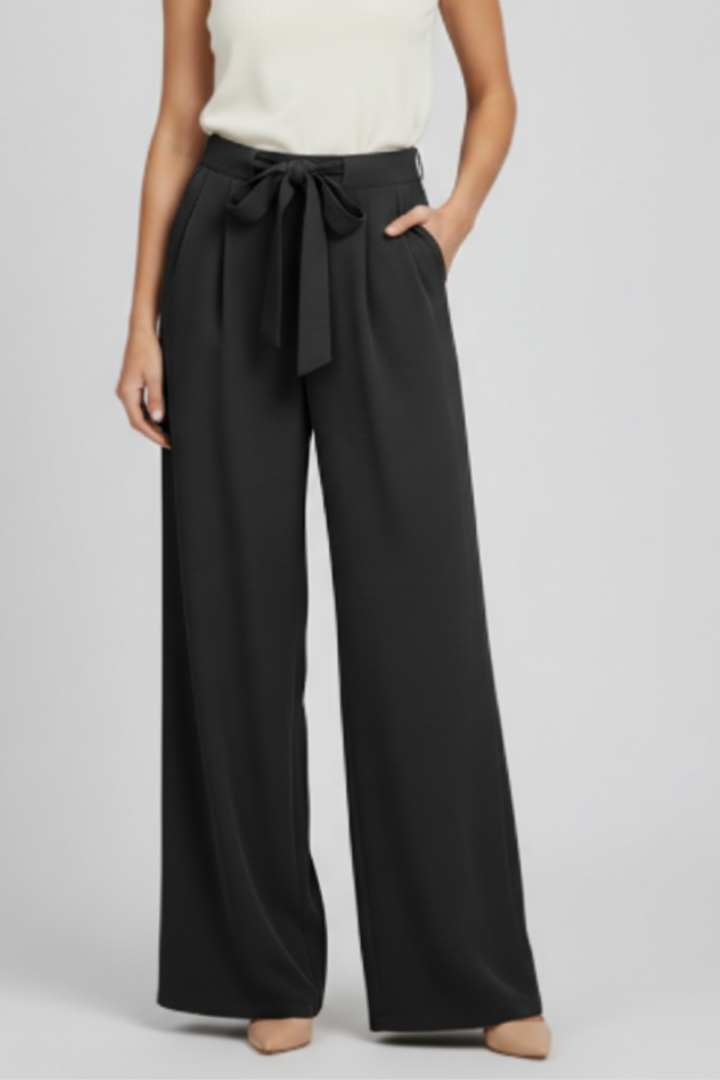Studio shot of women's olive green wide-leg drawstring palazzo trousers, highlighting their versatility.