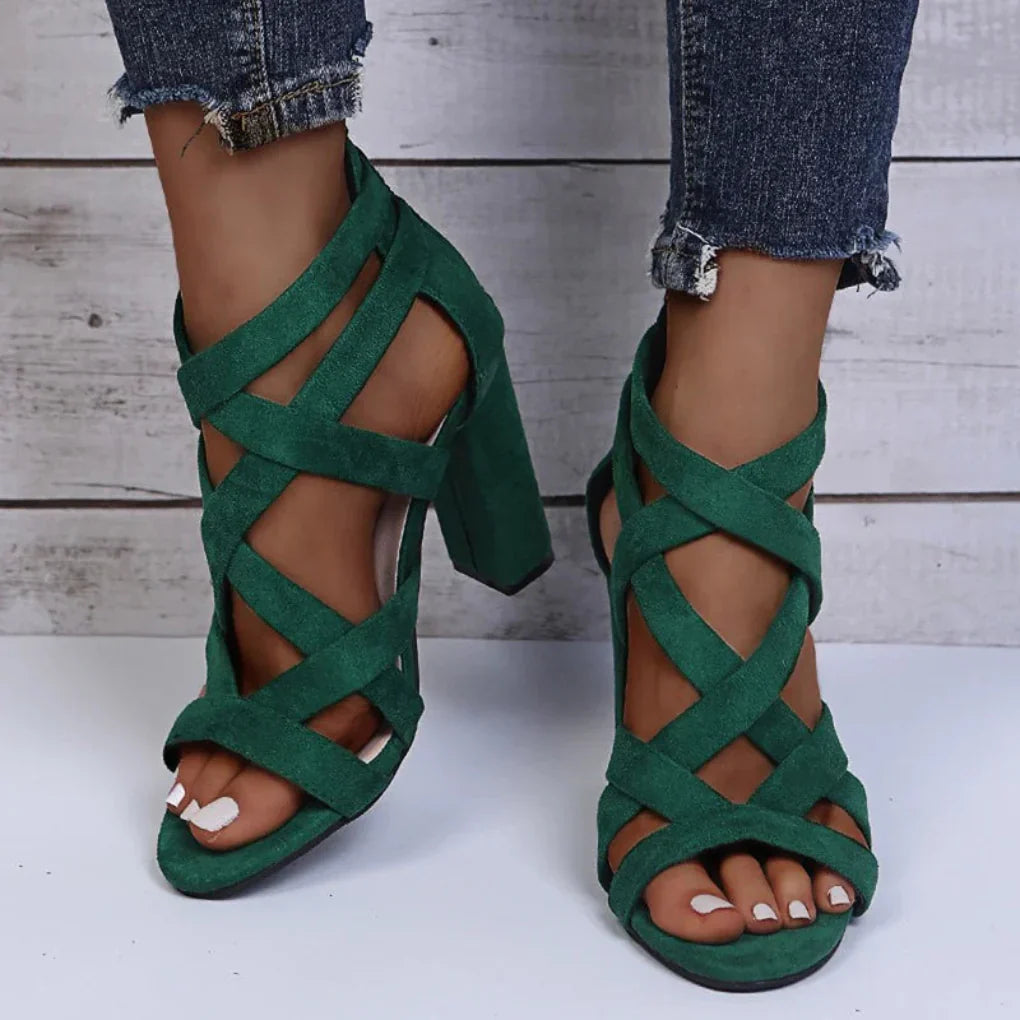 Stylish women's black strappy block heel sandals, versatile for casual or dressy outfits
