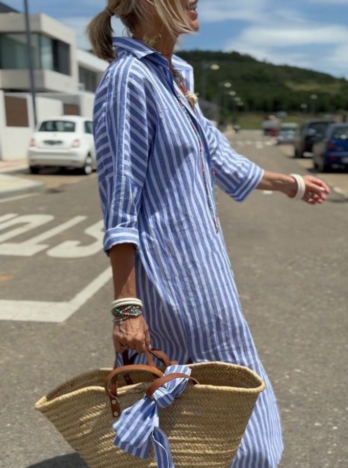 Stylish women's striped long sleeve midi shirt dress with functional buttons, perfect for casual wear