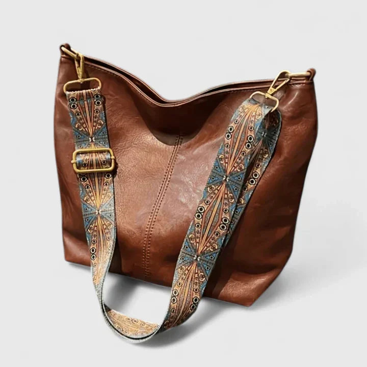 Demi women's crossbody bag with bohemian flair, a trendy accessory for fashion-conscious women.