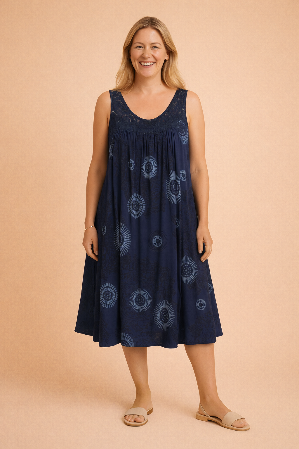 Women's sleeveless bohemian midi dress with unique mandala print, great for summer fashion.