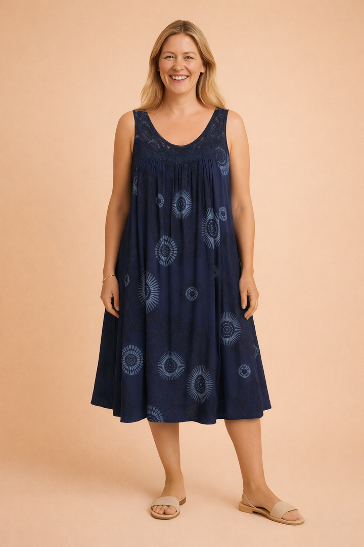 Women's sleeveless bohemian midi dress with unique mandala print, great for summer fashion.